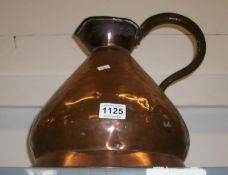A large early Victorian copper jug