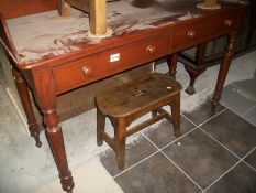 A mahogany 2 drawer side table
A mahogany 2 drawer side table