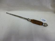 An old meat skewer with silver top and band and antler horn handle