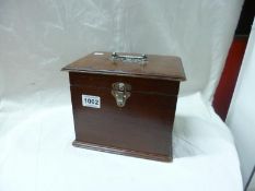 A mahogany stationary box