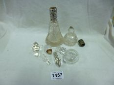 A silver top bottle (no stopper) a silver top bottle a/f and a quantity of stoppers etc