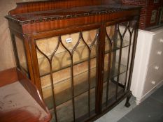 A mahogany astragal glazed cabinet