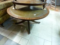 A circular table with leather inset