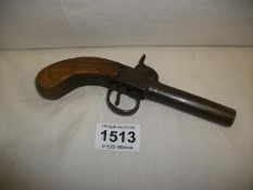 An old percussion pistol