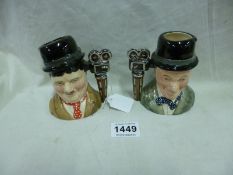 A pair of Royal Doulton character jugs being Laurel and Hardy