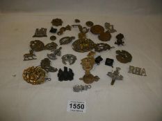 A quantity of WW1 military badges and buttons