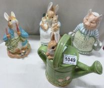 3 Border Fine arts Beatrix Potter money boxes and a watering can