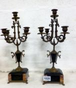 A pair of 5 branch candelabra on marble bases