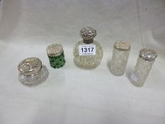 5 silver topped jars