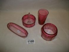4 items of cranberry glass