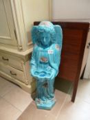 A large blue glazed Angel figure