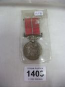 A George V Meritorious service medal, un-named