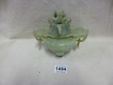 An Oriental pot with Dog of Foo on lid and handles (Possibly Jade)
