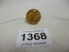 A 1908 gold half sovereign in 9ct mount, (size P)