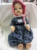 A vintage walking doll