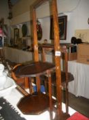 An oak folding cake stand