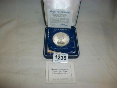 the 1977 Queen Elizabeth 25 dollar silver coin of the Cook Islands