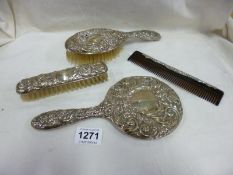 2 silver backed brushes, mirror and comb