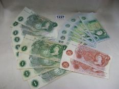 6 consecutive number £1 notes, 10 other £1 notes and 2 10/- notes