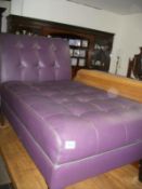 A purple day bed