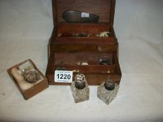 A concertina jewellery box and contents
