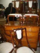 A set of 6 mahogany chairs comprising 2 carvers, 2 dining and 2 nursing chairs