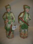 A pair of bisque figures