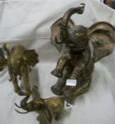 3 brass elephants