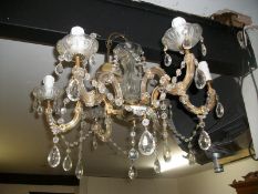 A 6 light glass chandelier