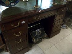 A mahogany kneehole desk