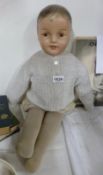 A vintage composition doll