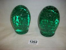 A pair of glass dumps