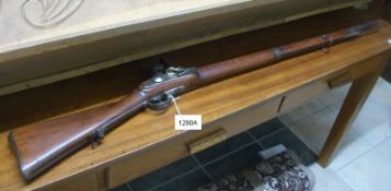 An early flintlock rifle in outstanding condition for its age