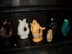 6 pottery fish vases