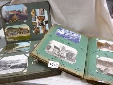 2 albums of postcards