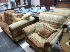 A good quality 3 piece suite comprising sofa, 2 chairs and large stool