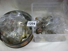 A box and tin of Foreign coins etc.