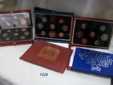 5 UK proof coins sets and a 1974 India set