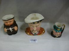 A Sylvac Henry VIII character jug, Sylvac cabby jug and a Goebel monk jug