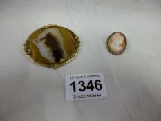 A Cameo brooch and a large stone set brooch