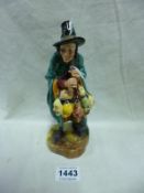 A Royal Doulton  figurine, The Mask Seller, HN2103