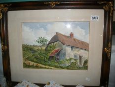 A framed watercolour watermill cottage signed H x Cooper 1958