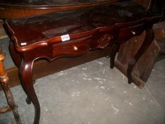 A mahogany console table