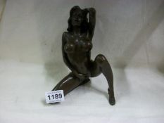 A bronze nude figure