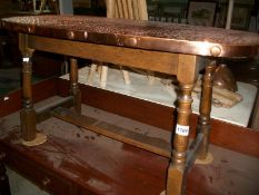 A copper topped table