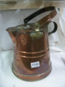 A copper and brass marine water carrier