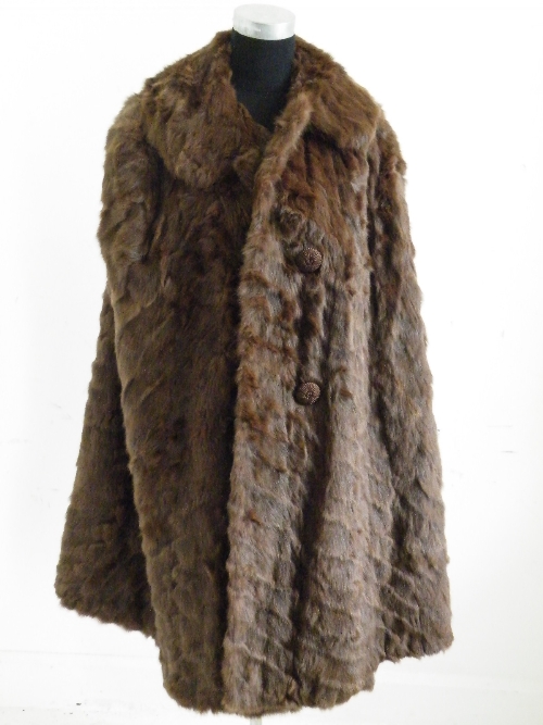 A ladies full length brown fur coat with Faulkes, Edgebaston Birmingham label