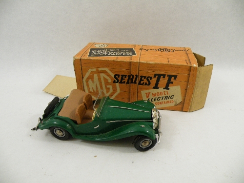 A Victory Models MGTF toy car, in green with the `Mighty Midget` motor and detachable windscreen and