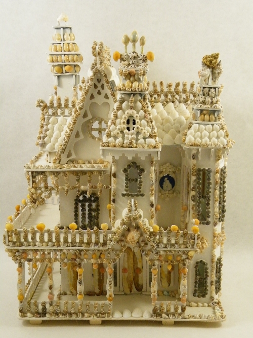 A Victorian grand style villa encrusted with sea shells, of recent manufacture 55cm high