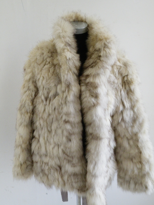 A Saga silver fox half-length fur coat, bearing label `Saga Fox`, size 12.